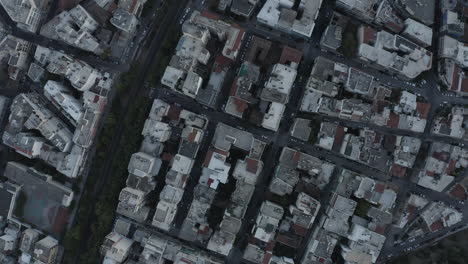 slow turning topdown shot of the athens city looking down on buildings, greece