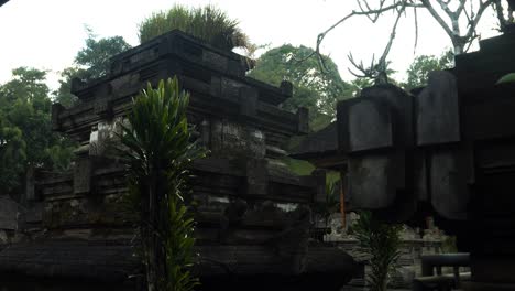 slow motion camera shot of temple ruins from pura tarta empul water temple on bali in indonesia in the village of ubud with historical story on a great trip