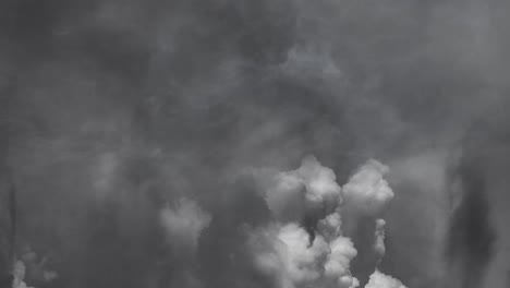 cumulonimbus clouds growing in the sky accompanied by lightning