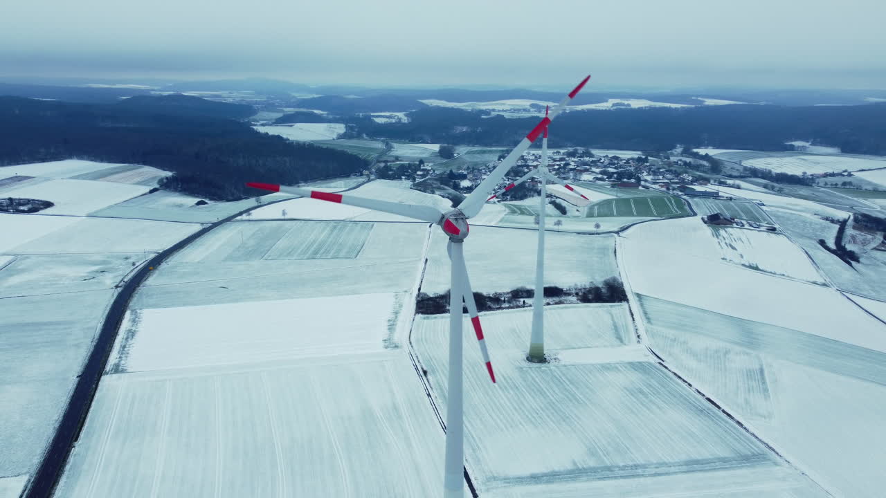 Snowy Landscape with Wind Turbines
