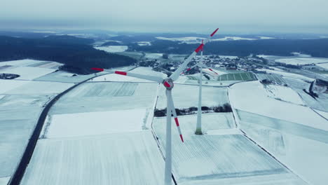 snowy landscape with wind turbines