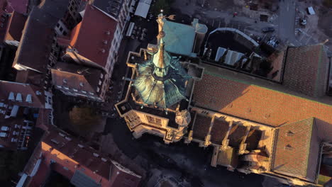 spire of saint martin's church in colmar, aerial high angle circling