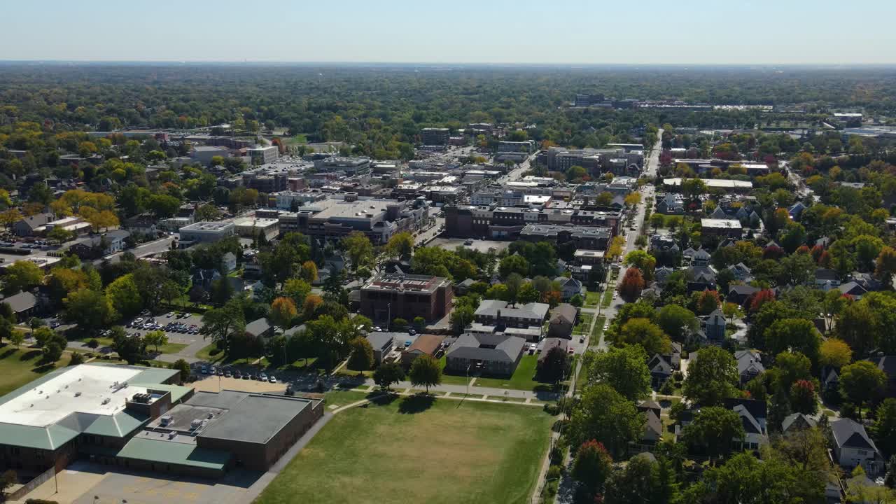 Naperville, IL, a Chicago suburb, on a sunny fall day, featuring buildings, streets. Crane Up Right Day S