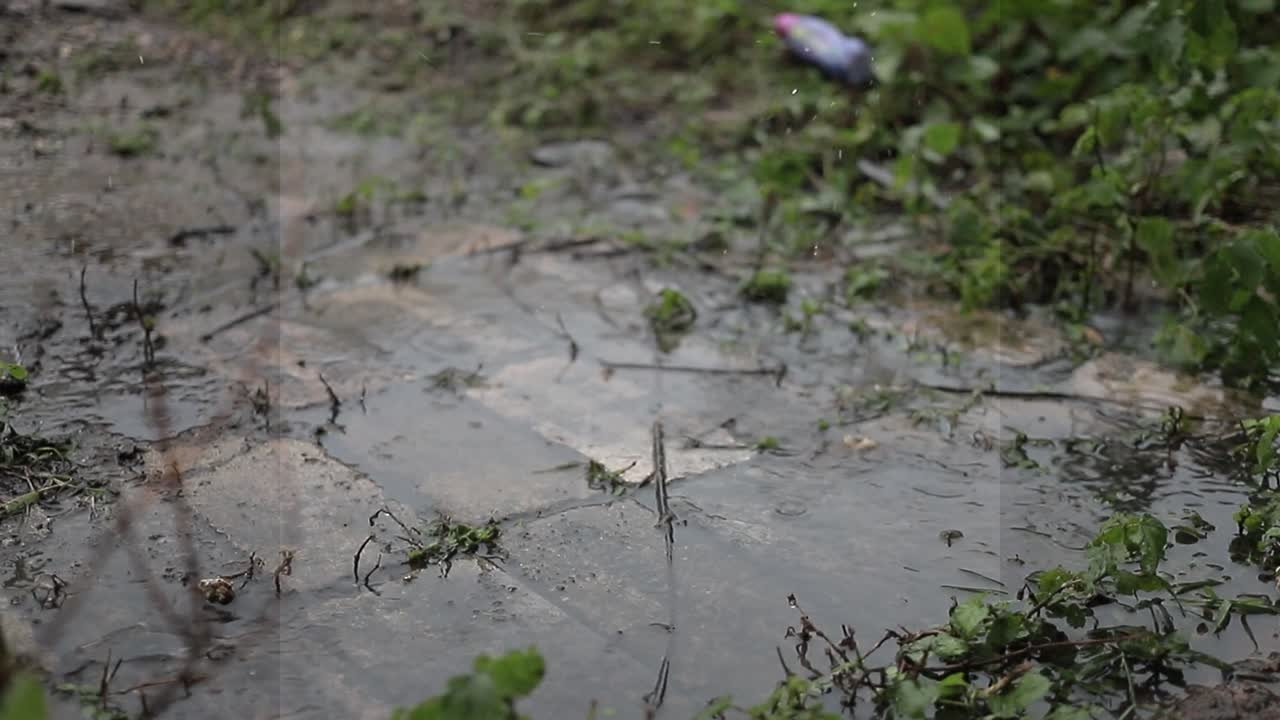 Rain falling on concrete floor, beautiful nature in rainy environment.