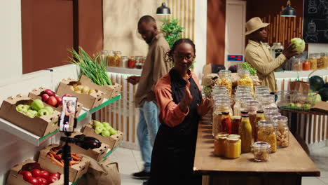 african american vendor promoting homemade sauces and honey