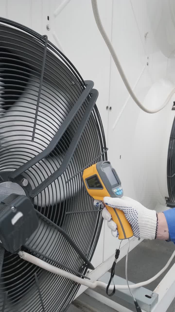 HVAC system inspection with infrared thermometer