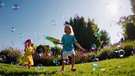 girls playing with bubbles in a sunny park