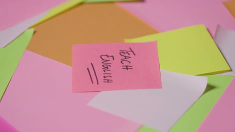 Education Concept Of Revolving Sticky Notes With Teach English Written On Top Note 1