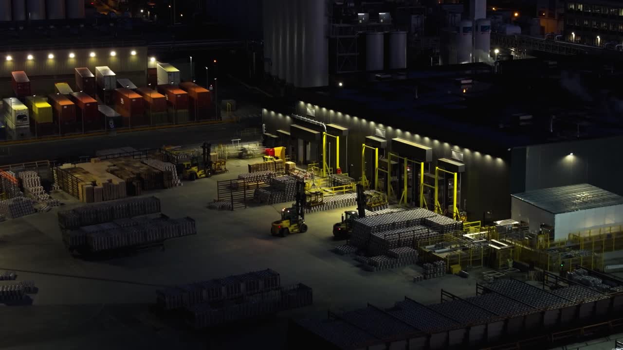 4K cinematic drone footage of the Guinness Factory exterior in Dublin, highlighting warehouse logistics, trucks, forklifts in motion, and the bustling industrial atmosphere._028
