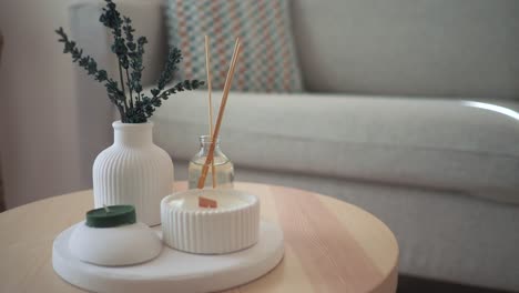 cozy home decor with candles and diffuser