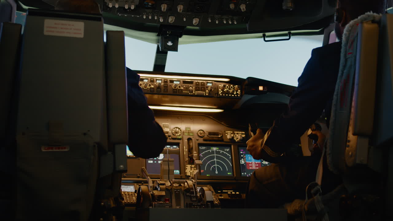 Diverse team of aviators throttling engine lever to takeoff