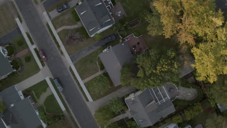 overhead view of houses and street, slow twist