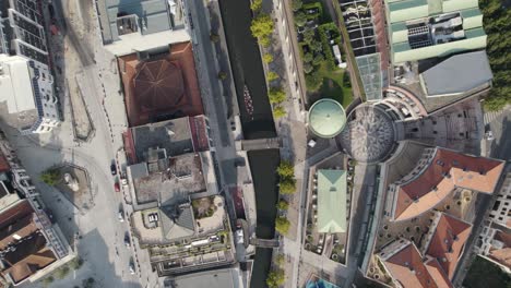 majestic city of aveiro with water canal and building rooftops, aerial top down view