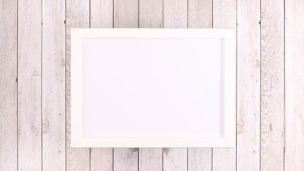 Different fruits and vegetables appear under white frame with place for text. Stop motion