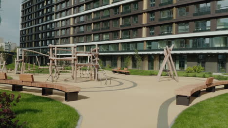 modern residential complex with a children's playground