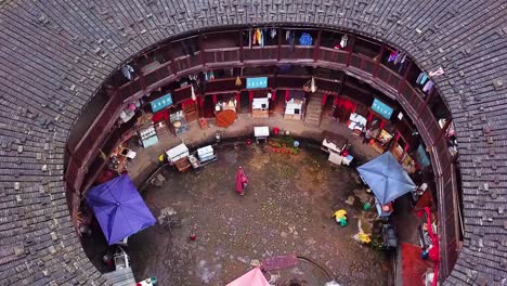 Birds-Eye-View-closeup-aerial-shot-of-a-Unesco-World-Heritage-Tulou-Hakka,-Fujian,-China