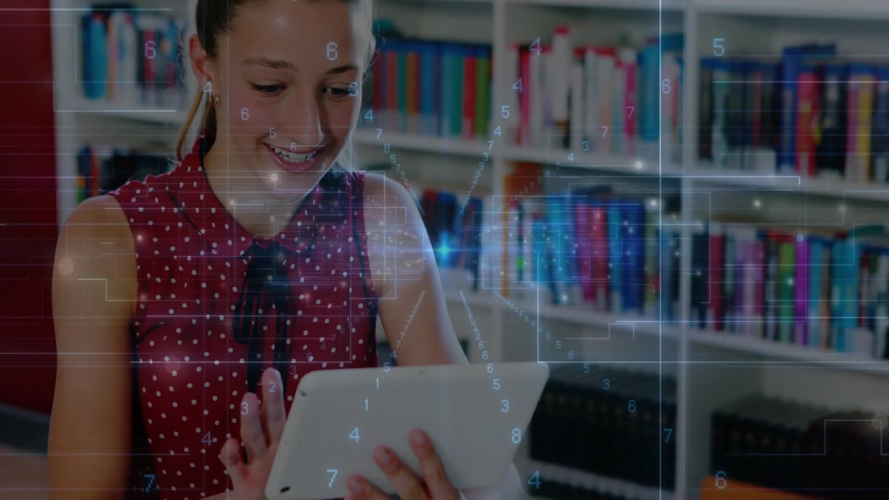 Teenage student picking up tablet and swiping to animate holographic study interface for learning