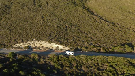 Excellent-Aerial-Shot-Of-An-Rv-Driving-On-Great-Ocean-Drive-In-Esperance,-Australia