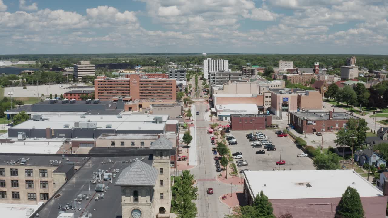 Muskegon, Michigan skyline with drone video moving down