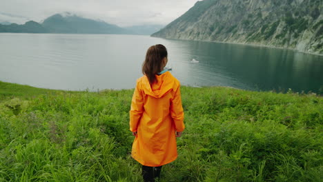 woman hiking in alaskan fjords