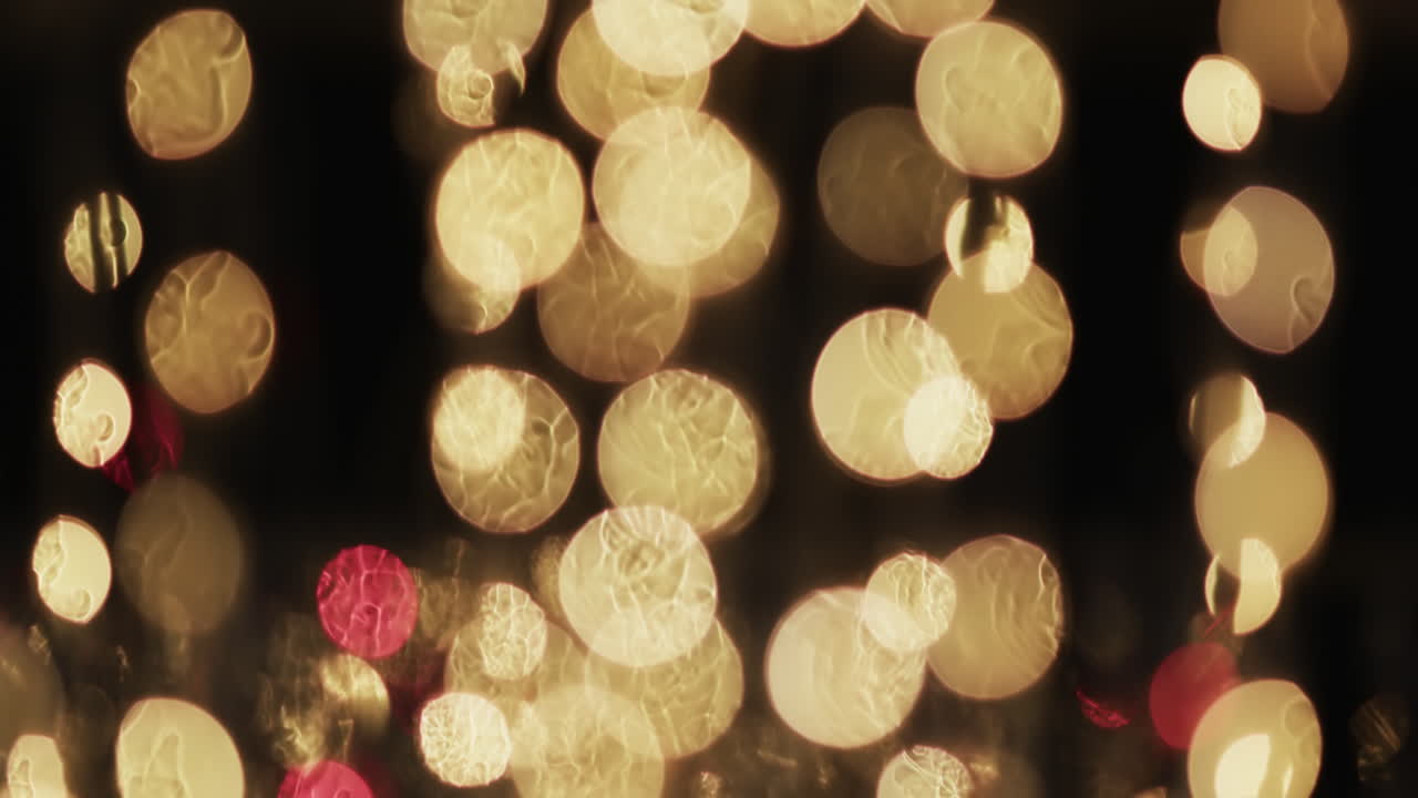 video de puntos de luz bokeh amarillos parpadeantes con espacio de copia