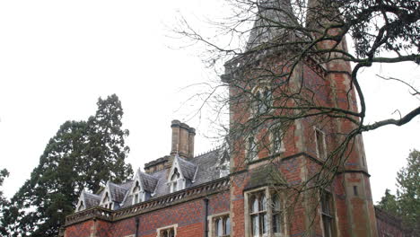 A-victorian-manor-house-hotel-in-the-country-with-gothic-architecture-and-spooky-windows