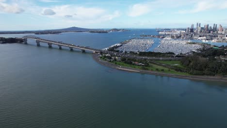 auckland harbour bridge, westhaven marina, and auckland cbd on north island, new zealand