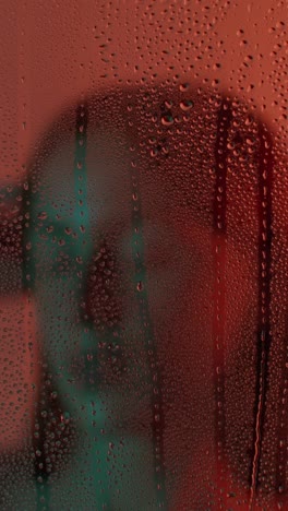 water droplets on a colored window