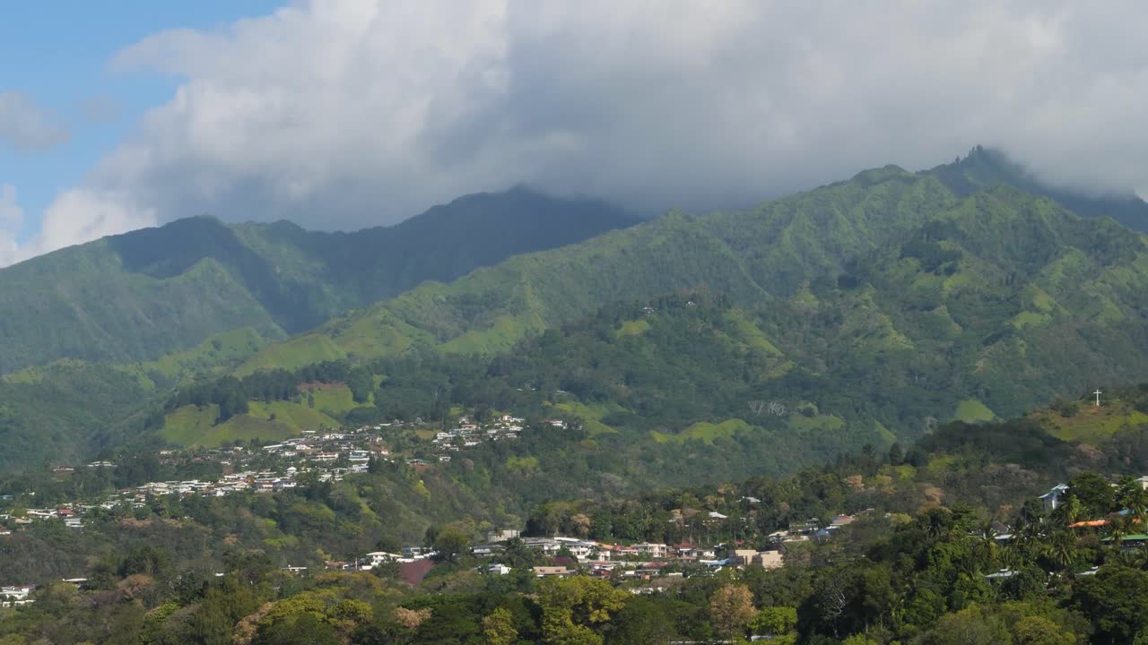 Beautiful landscape around the capital city of Papeete, Tahiti, French Polynesia.Mountains covered by clouds.