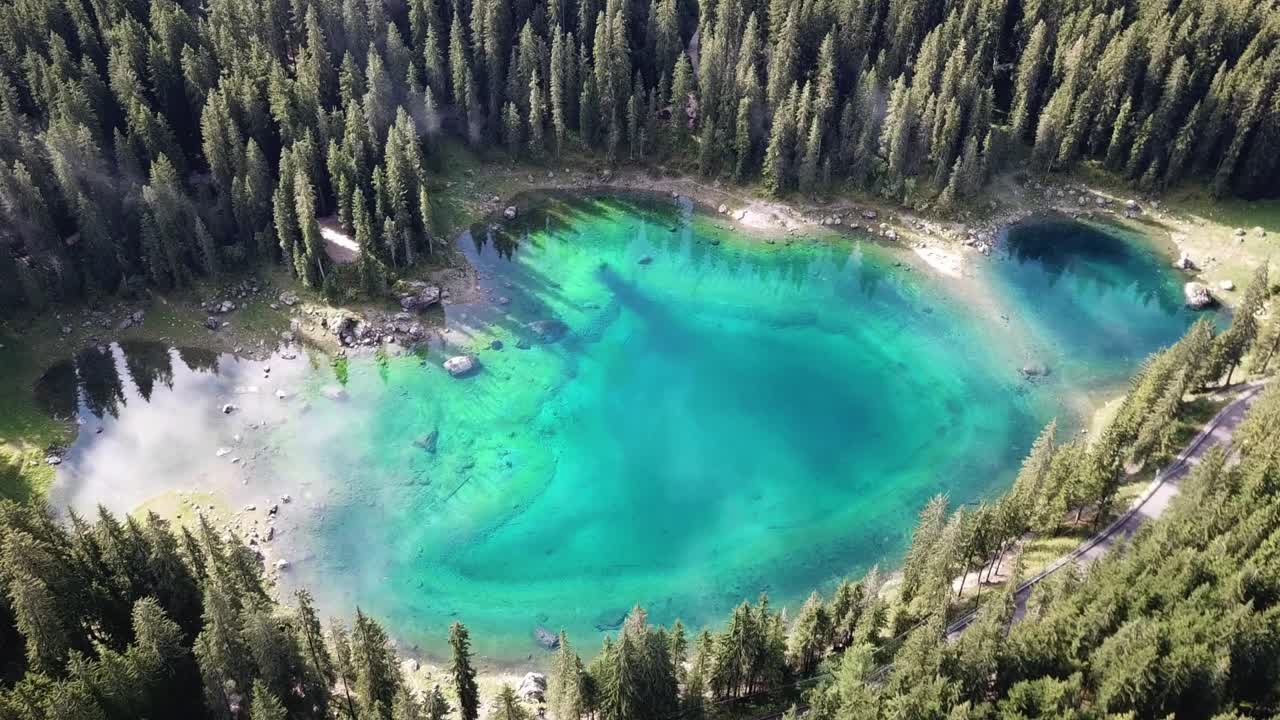drone footage of the Karersee, South Tyrol, Italy