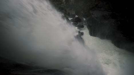 Stream-Strongly-Flows-From-Steep-Mountains-At-Devil's-Cauldron-Waterfall-In-Rio-Verde,-Banos,-Ecuador