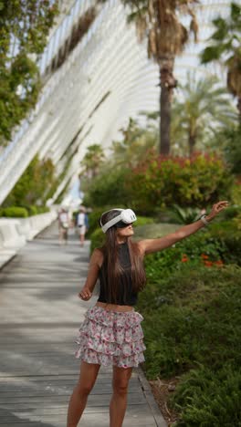 woman experiencing virtual reality in a park