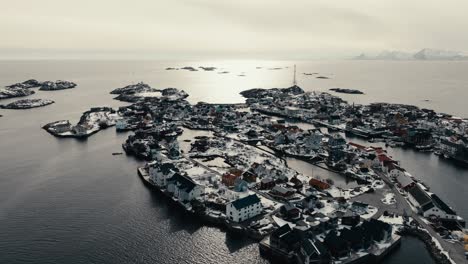 henningsvaer village on a bright day in nordland, norway. - aerial shot