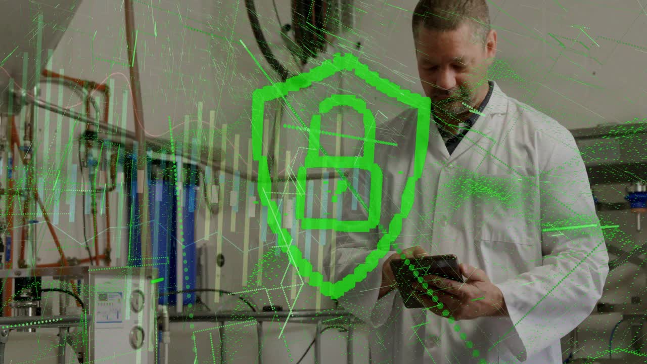Male engineer tapping tablet and initiating data security animation over industrial control panel