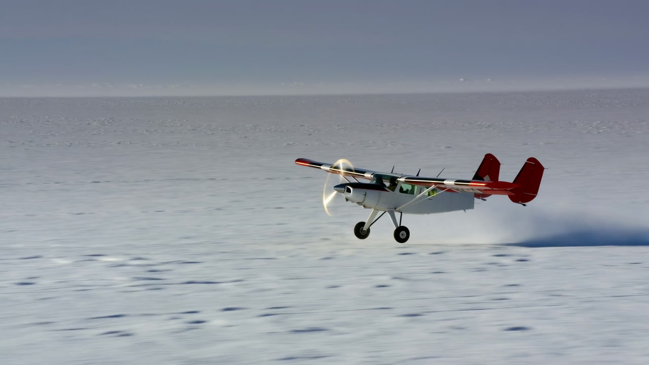 Red Ski Plane Skimming Frozen Sea, Remote Arctic Takeoff With Spinning Propeller And Ski Gear Leaving Trail