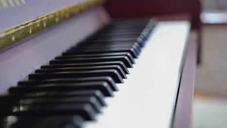 close-up of a piano in the living room