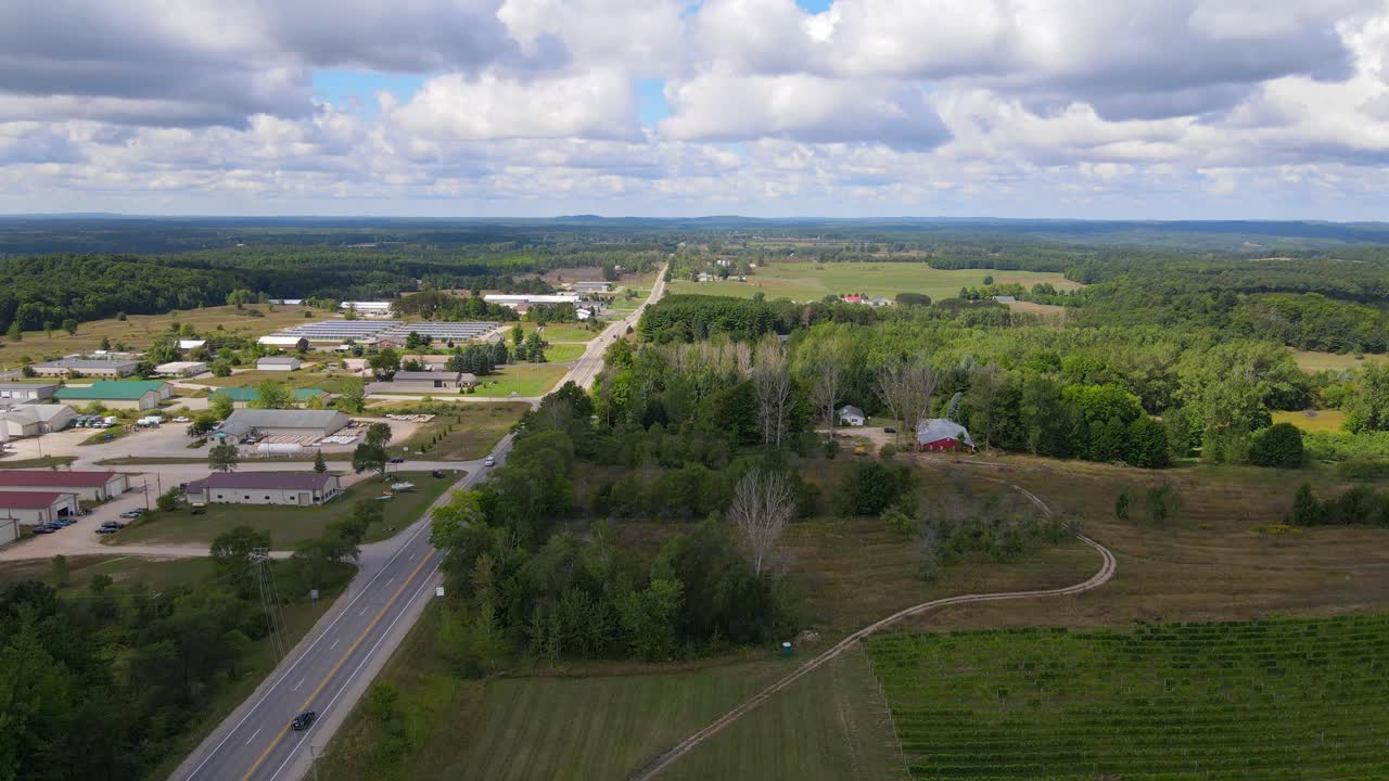 Countryside town and endless landscape of Michigan, aerial view