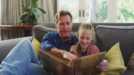 Grandfather-and-granddaughter-spending-time-together-