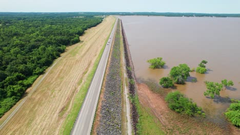 aerial footage of the lake texoma dam. camera is facing approximately south.