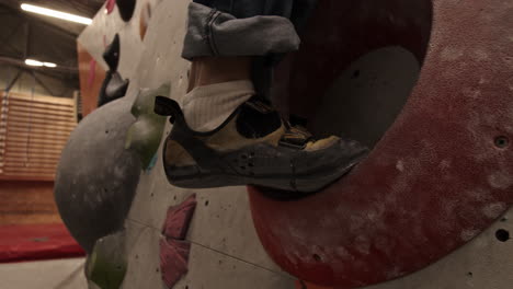 person rock climbing