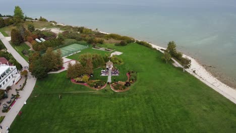 drone shot of gazebo by ocean