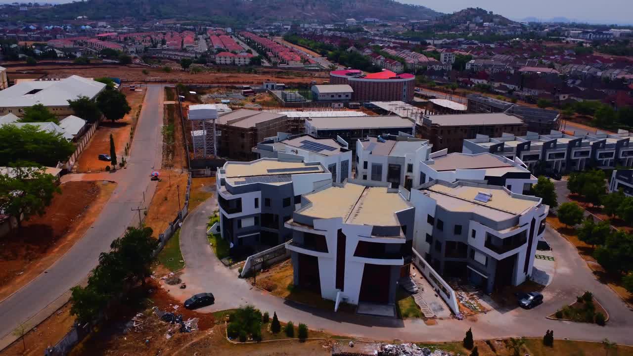 Modern luxury estates and vibrant rooftops in Lifecamp Abuja viewed from above