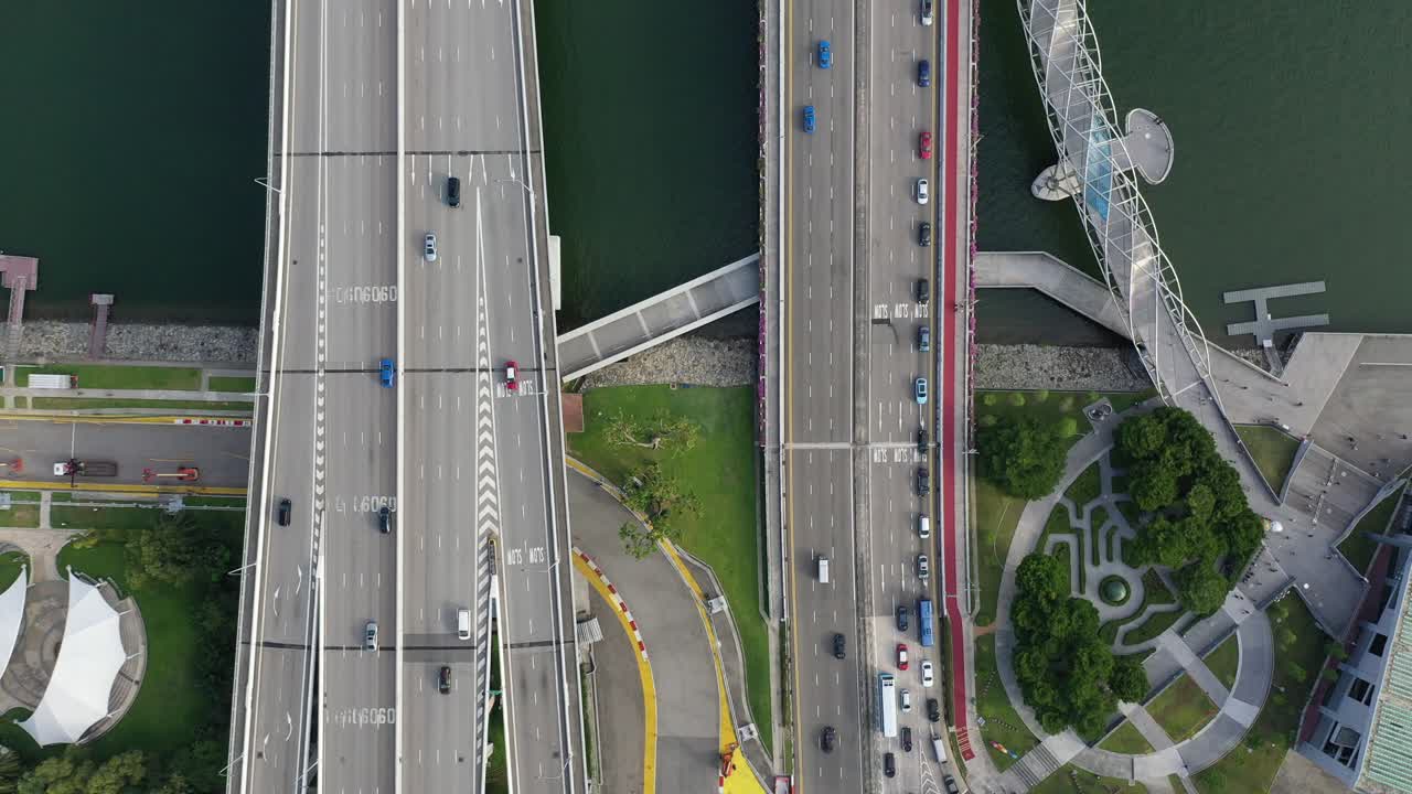 Drone footage over the Helix Bridge in the Marina Bay Area in Singapore.