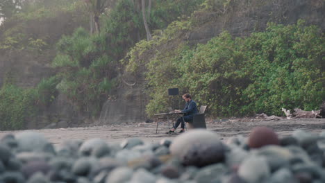 man working outside in tropics