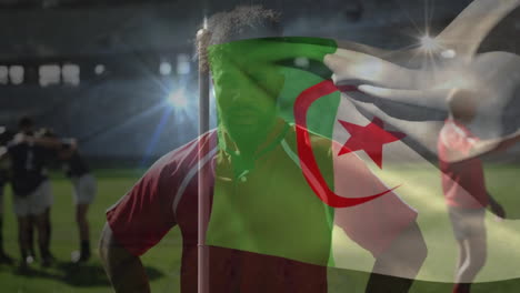 huddling on field, rugby players with algerian flag animation in background
