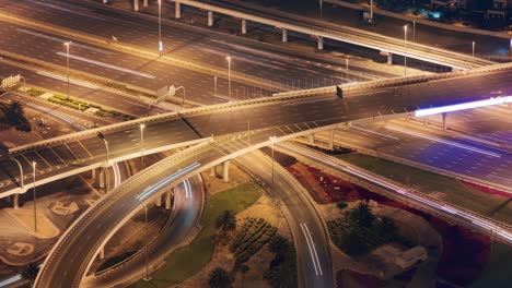 night illumination traffic crossroad junction 4k time lapse dubai united arab emirates