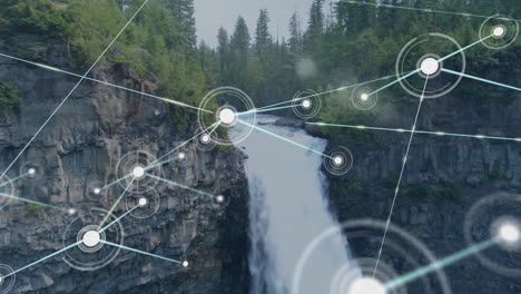 animation of network of connections with icons over mountain landscape