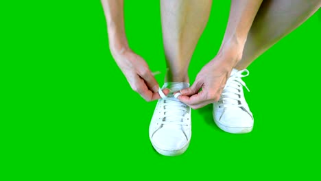 woman shoelace green screen background