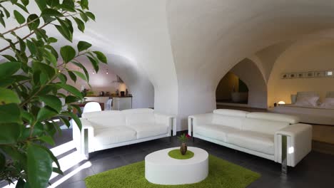 slow revealing shot of a luxury master bedroom with an arched ceiling in nimes