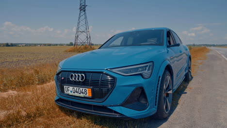 audi electric car on highway. detail view of the audi e-tron 55 quattro suv electric car